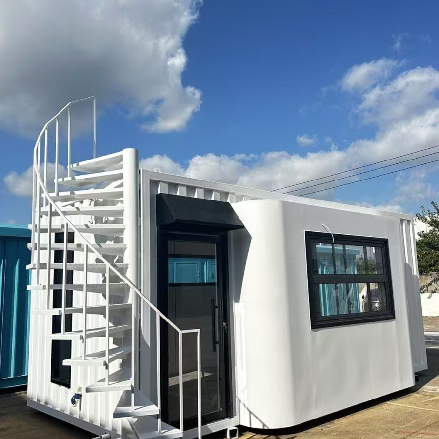 Modular construction site office project in Indonesia with prefab office unit, exterior staircase and temporary site workspace.