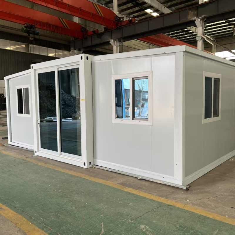 Side view of an expandable container house with standard exterior finish