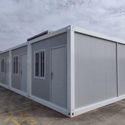 Single-story flat pack container house exterior with modular steel structure and insulated wall panels